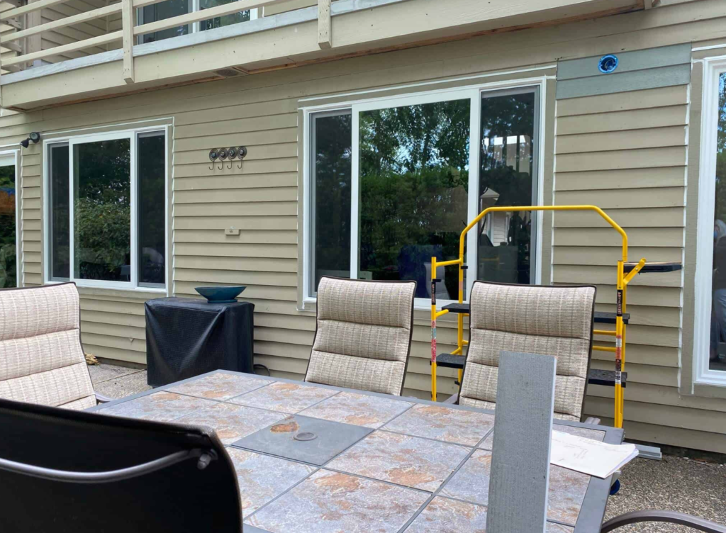 Modern patio with newly installed energy-efficient sliding windows for a home in Beaverton, OR.