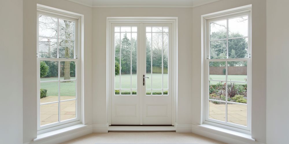 Replacement windows and doors in Tualatin, OR with French doors and a garden view