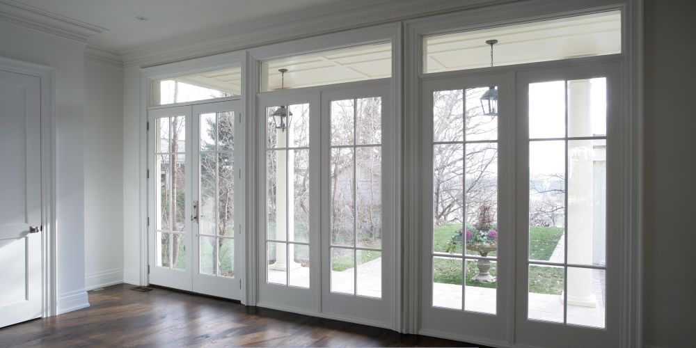 Replacement windows and doors in Wilsonville, OR with white French doors interior