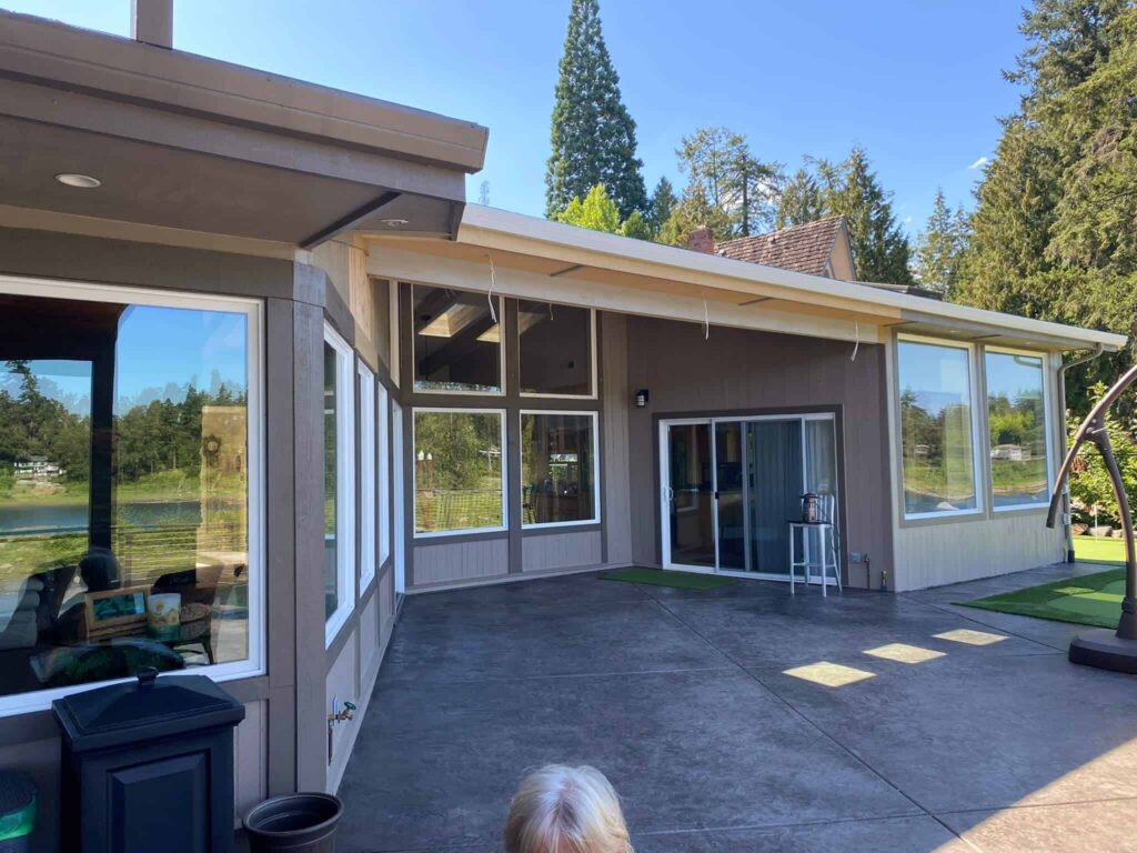 Bright home exterior with large replacement windows in Beaverton, OR