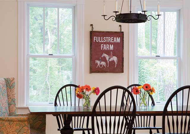 Bright dining room with large replacement windows and natural views in Tigard, OR